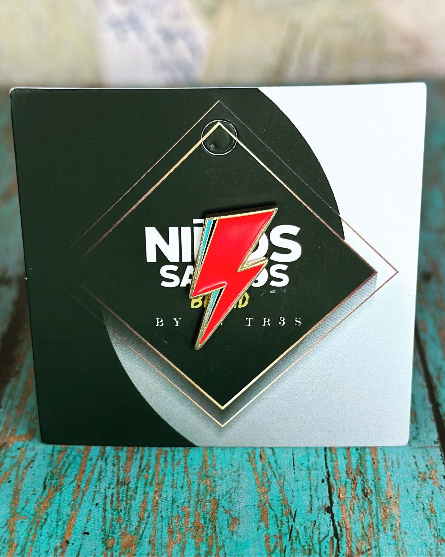 Red lightning bolt pin