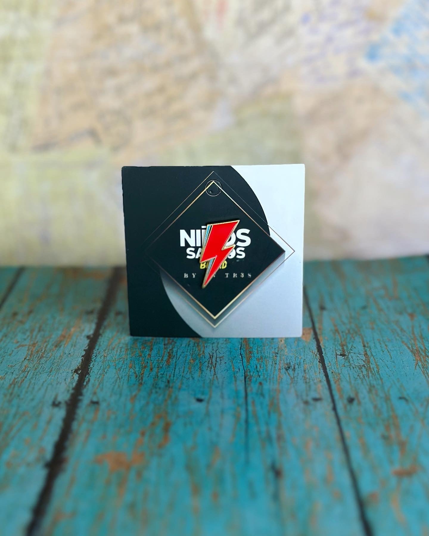 Red lightning bolt pin